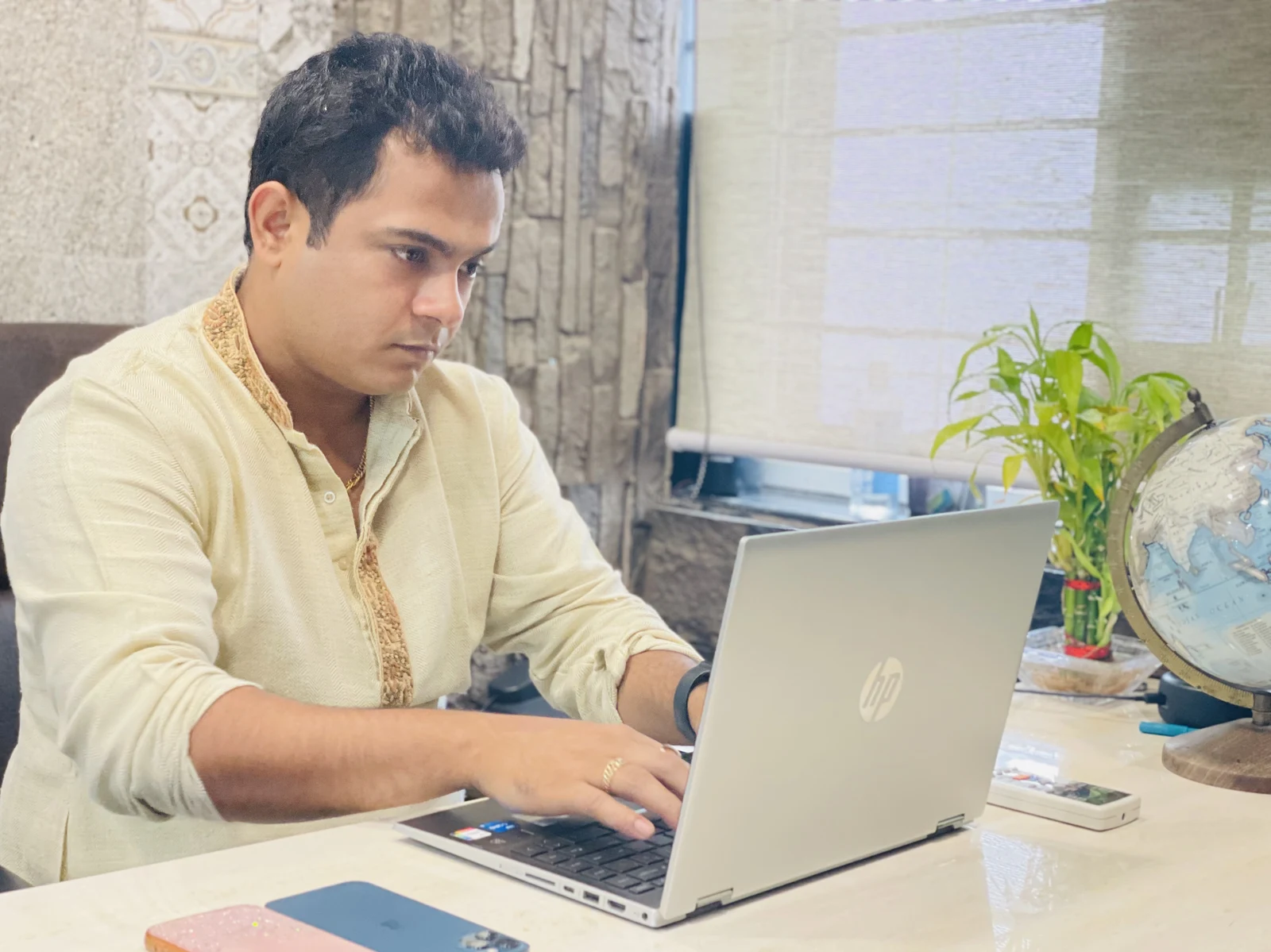 Vishwajeet Singh, Founder & Managing Director of Welscon Technologies, working at his desk in the Welscon Technologies office